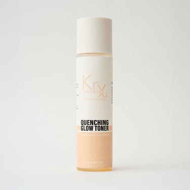 bottle of facial toner with peach and white colored label