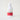 white bottle of face cream with a red label
