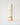 face cleanser in a clear bottle with peach colored label