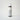 black pump bottle of facial cleanser with white label
