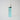 bottle of blue skincare liquid in a spray bottle 